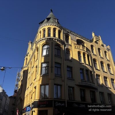 Both bronze cats on the roof of the Cat House, Riga, Latvia